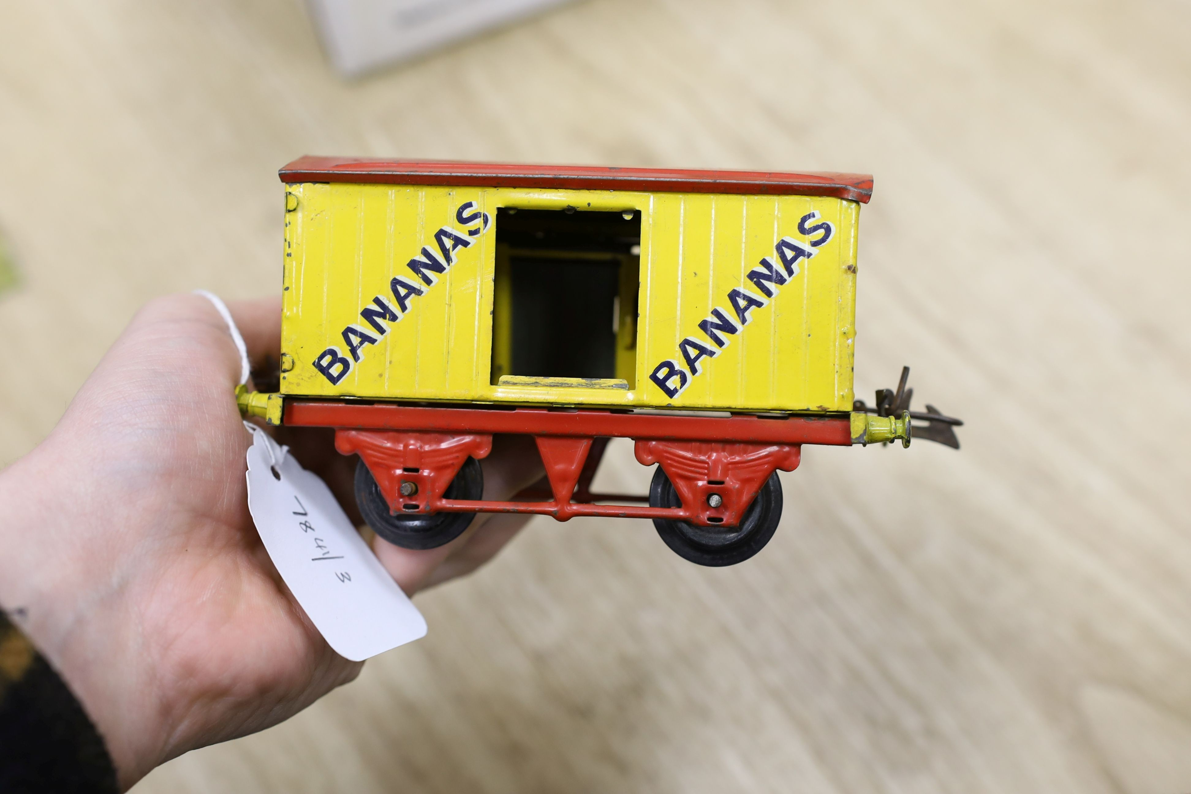 A mixed quantity of Hornby model railway track, a metal crossing, an engine and other items